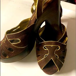 Brown and gold strap heels.